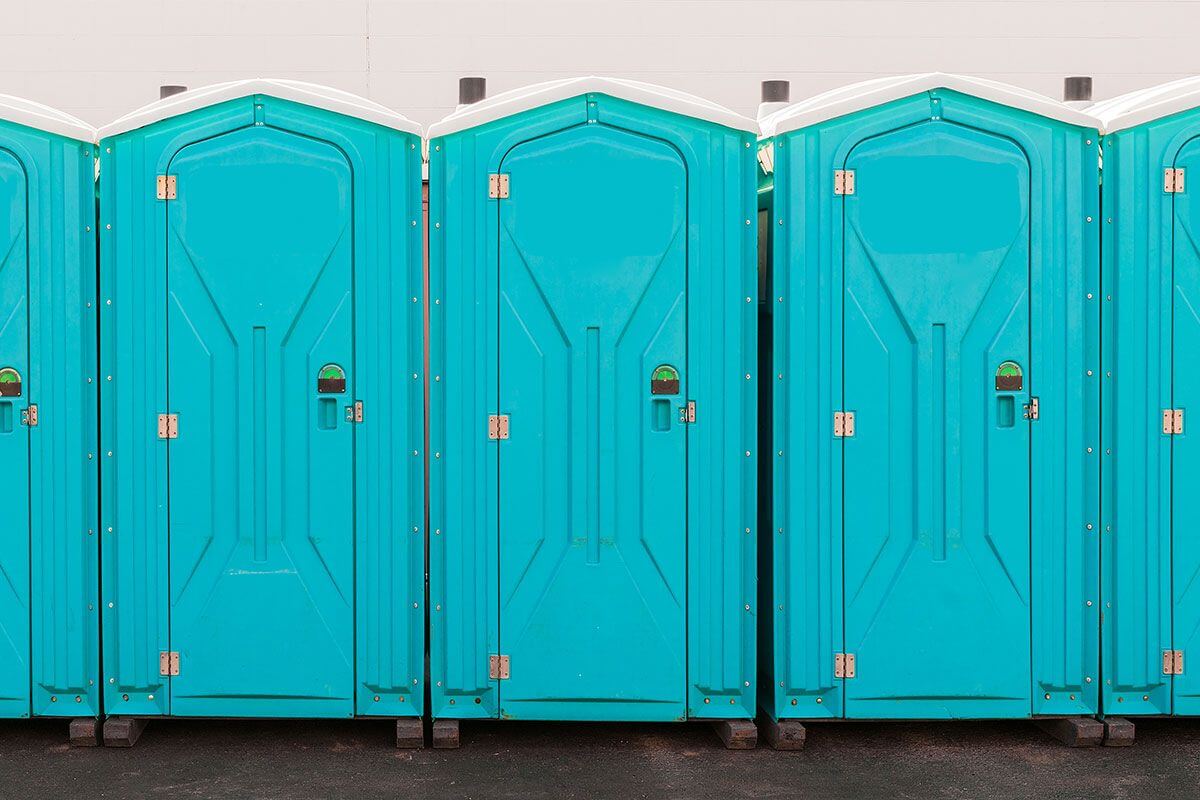 Industrial portable restroom units at a plant in Orlando, Florida